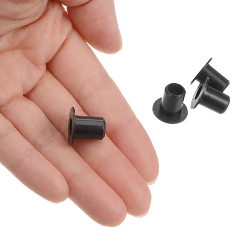 Flanged Nylon Sleeve Bearings Set Of 4 with 6.2mm bore shown in hand, black self-lubricating bushings for shafts, wear-resistant.