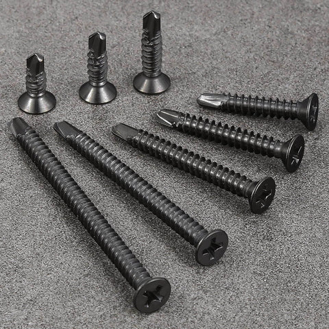 Collection of 250pcs #8 x 1-1/4 Inch Flat Head Self Tapping Sheet Metal Screws Black Stainless Steel on gray surface
