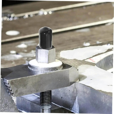 80 Pack Flexible Bolt Caps And Thread Protector End Caps for metal tubing, shown installed on a steel bolt for protection against dirt.
