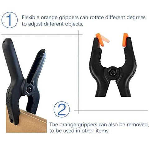 Plastic 4.5 inch spring clamp, black body with orange jaw tips, for crafts and photography