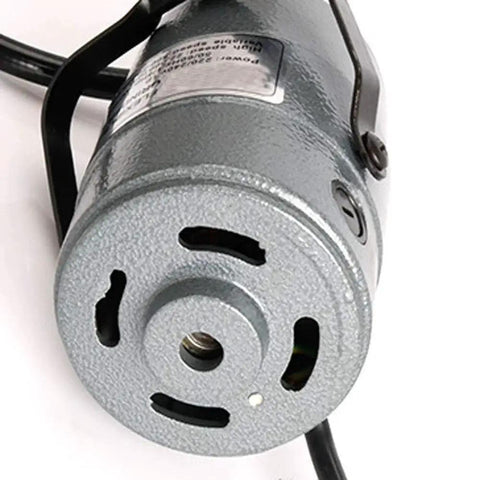 Close-up of the motor component from Flexible Shaft Grinder Carver Rotary Tool Set With Hanging Overhead Motor And 30 Piece Attachments