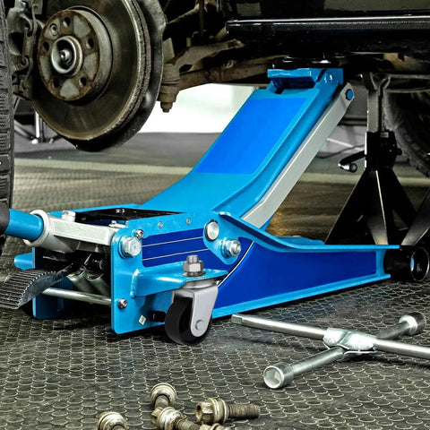 2 Pcs Floor Jack Casters For 4 Ton Floor Jack With Cast Iron Construction And 16mm Stem installed on a blue floor jack in a garage.