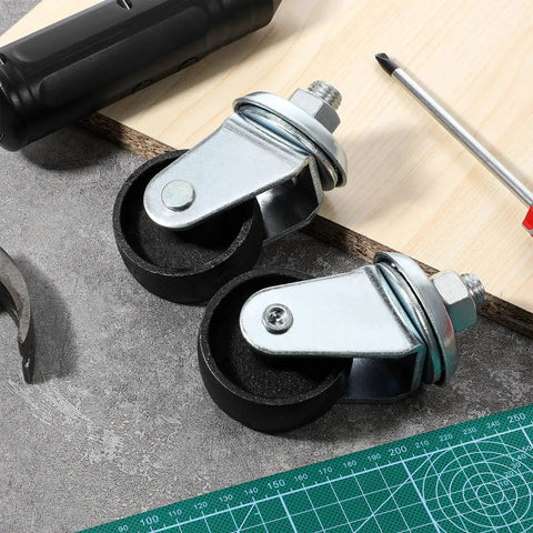 2 Pcs Floor Jack Casters For 4 Ton Floor Jack With Cast Iron Construction And 16mm Stem on a workshop table with tools.