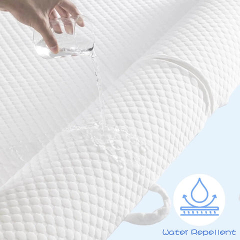 Foldable Toddler Bed Rail With Safe Bumper And Flap Non Slip Machine Washable Cover showing water repellency in close-up view.