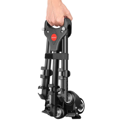 Hand holding folded ✝️ Photography Tripod Dolly, Heavy Duty 50lbs Capacity Tripod Wheels with 3" Rubber Wheels for DSLR Cameras