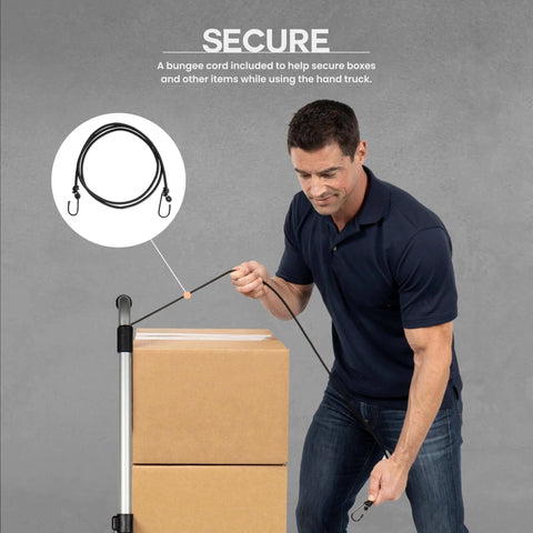 Man securing boxes with bungee cord on 275 Ibs Capacity Folding Hand Truck Dolly – Lightweight Aluminum Frame Dolly Cart with 42" Telescoping Handle.