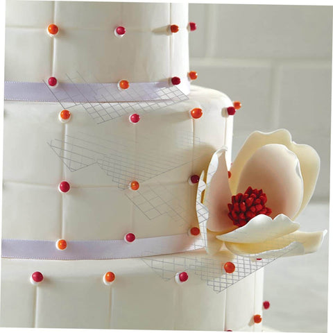 Decorated cake using 8 Piece Flexible Silicone Cake Mold Set With Grid Pattern For Fondant Impressions, 12.48 by 6.18 Inches
