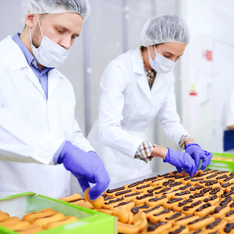 Workers handling food wearing Heavy Duty Nitrile Gloves Disposable Powder Free Latex Free Rubber Free Ultra Strong For Food Handling