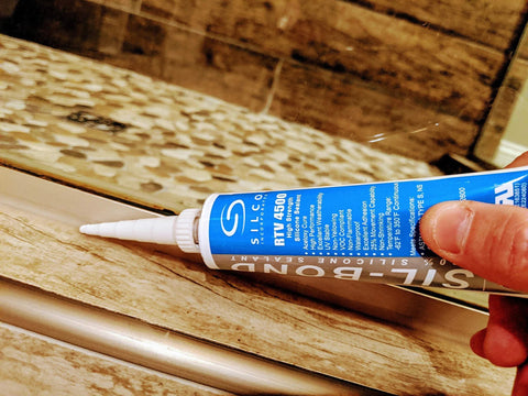 Applying Food Safe RTV Silicone Sealant 4500 Clear High Strength 2.8 Oz NSF Certified Food Contact Safe to a kitchen surface