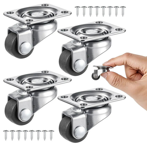 Four Pack Half Inch Low Profile Caster Wheels With Rubber Rollers for furniture, shown with screws and hand for size reference.
