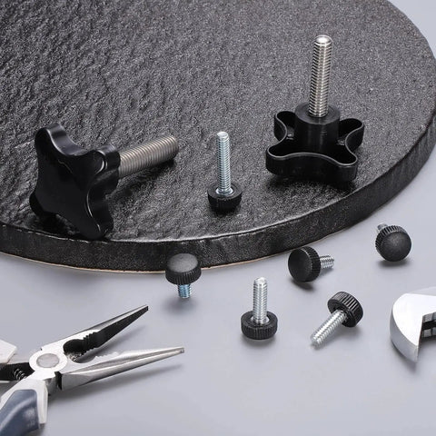 Four Point Knobs With Half Inch Thirteen UNC Threads And Two Point Zero Nine Inch Threaded Stud, tools and fasteners shown