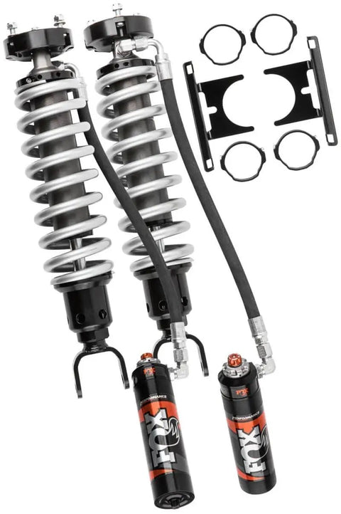Fox Factory Front Coilover Shock Absorbers 883-06-166 for Ram 1500, black finish, 2.5-inch travel, shown with mounting kit.