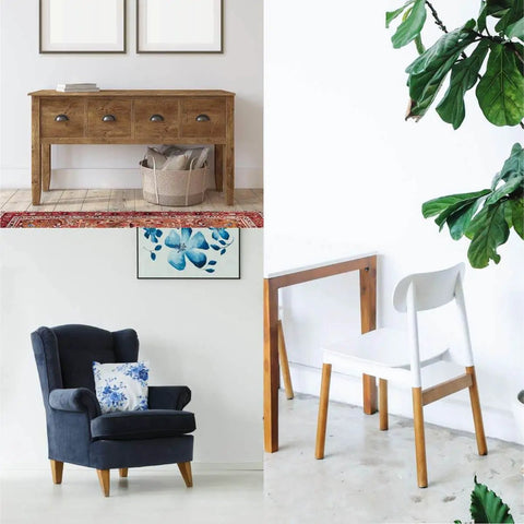 Home interior featuring wooden furniture, a blue armchair, a wooden sideboard, and a white chair with a table amidst green plants.