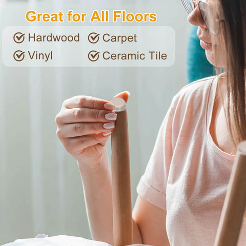 Person applying Furniture Sliders, 8Pcs 2" - Plastic Self-Adhesive Square Sliding Pads to chair leg, suited for multiple floors.