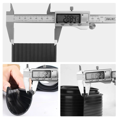 Wayne Dalton garage door bottom weather seal, black vinyl, measured with digital caliper at 28.84 inches.
Close-up of black vinyl weather seal being peeled from its roll for installation.
Rolled Wayne Dalton weather seal, black, with caliper showing thickness around 0.1525 in.
