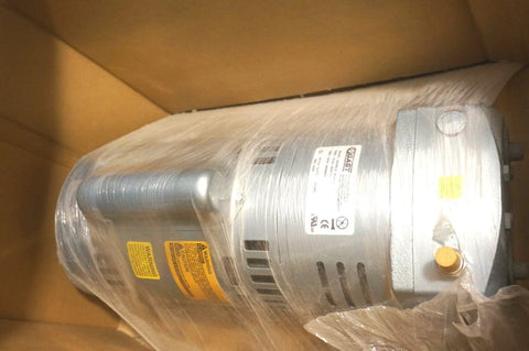 Gast 1023-101Q-SG608X Replacement Rotary Vane Septic Air Pump in packaging, showing motor and clear labeling, side view