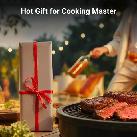 Wrapped gift and grilling steak outdoors with someone holding a beverage in the background, blurred setting sun.