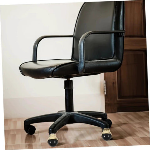 Black office chair with Gold Ball Caster Wheels Set 5 Pieces For Desk And Office Chairs, smooth rolling on hardwood floor.