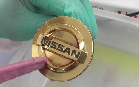 2 Oz Gel 24K Brush Gold Plating Solution For Fast Durable Brilliance on Nissan emblem