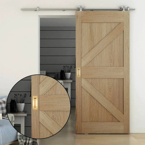 Recessed Finger Flush Pulls For Pocket Doors And Sliding Barn Doors in gold finish shown on wooden sliding door, front view