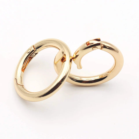 Two gold zinc alloy carabiner clips displayed front-on, part of Twenty Pack Trigger Spring Round Carabiner Clips Snap Hooks For Keyrings Buckles Bags Purses