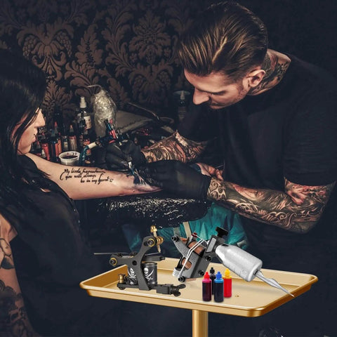 Premium Aluminum Salon Tray With Adjustable Height From 26 To 43 Inches On Wheels, Corrosion Resistant Mobile Tool Tray For Beauty Spa And Dental Clinics, Gold Finish With Four 360 Degree Rotating Casters in use at tattoo studio
