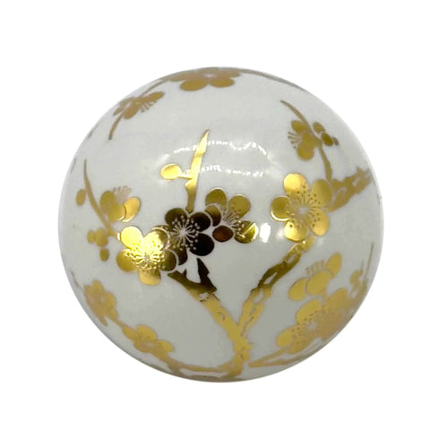 Close-up of 4" Gold & White Floral Chinoiserie Ceramic Ball from 3Pack - Decorative Ball Vase Bowl Filler, showing gold floral design.