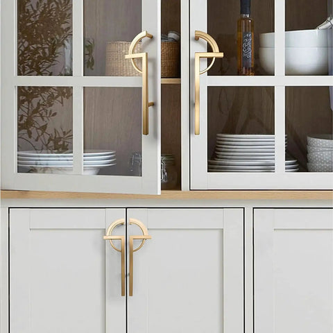 2 Pack Gold Zinc Alloy Cabinet Pulls Modern Minimalist Handle Set installed on gray kitchen cabinets and drawers