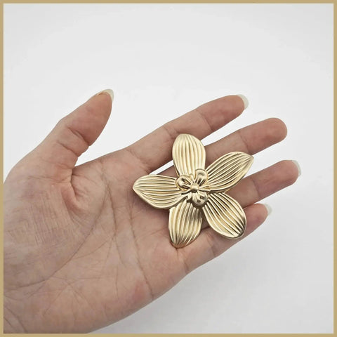 Hand holding Six Pack 2.4 Inch Gold Flower Cabinet Knob for Dresser and Drawer Furniture Hardware Vintage Floral Petal Pulls
