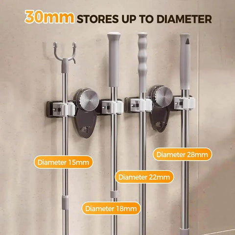 Broom Holder Mop Hanger, 2026 New No punching required Broom Hanger Organizer holding tools, showing various diameter handles.