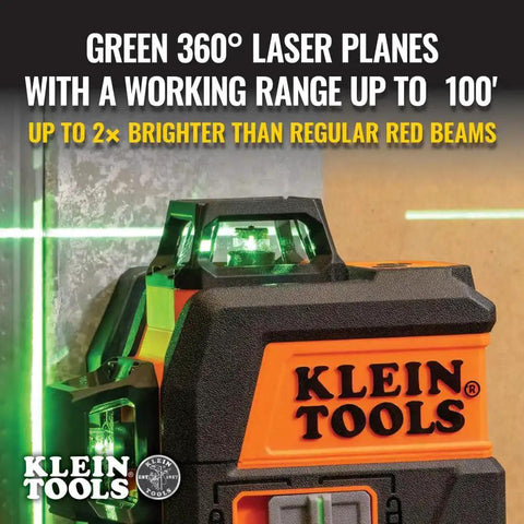 Compact self-leveling laser level with bright green cross lines, 360-degree planes, mounted on a wall, orange casing, Klein Tools logo.