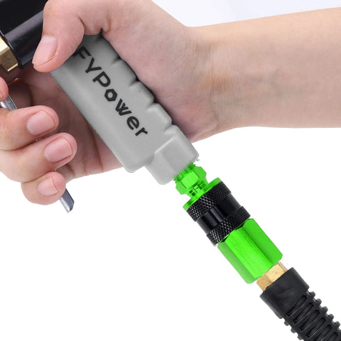 Person attaching Pro Grade 17 Piece Aluminum Air Fittings Kit With One Quarter Inch NPT Couplers And Plugs, green connector.