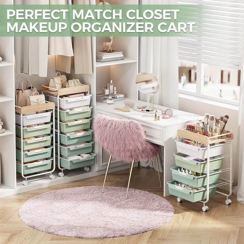Rolling Storage Utility Cart With Four Drawers For Craft Art Supplies And Makeup Organization On The Go Mobile Cart With Green Finish And Wooden Tabletop Perfect For Kid Rooms Or Office By SYKIARIOL in a room setting next to a white desk and pink chair.