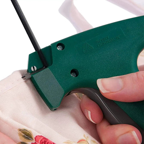 Ultra Fine Needle Tagger Kit With Black White And Color Fasteners For Fabric Safe Clothing Repairs Quilting Crafts And DIY Projects MicroStitch All In One Tagging Gun in use on fabric.