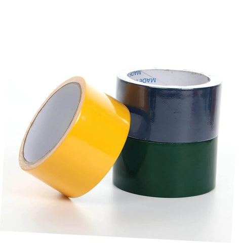Three rolls of heavy duty film tape in yellow, black, and green colors for indoor and outdoor use and emergency fixes.