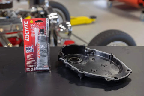 RTV Grey High Performance Silicone Gasket Maker For Oil Resistant Seals In High Torque High Vibration Automotive Engines Built For Tough Auto Work OEM Approved Flexible And Durable Sealant 80 Ml 1 Pack tube next to engine part