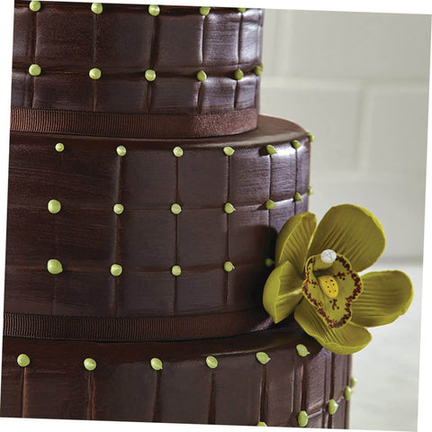 Close-up of chocolate cake with grid pattern and flower, made using 8 Piece Flexible Silicone Cake Mold Set With Grid Pattern For Fondant Impressions