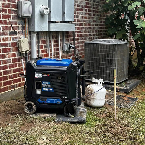 Three Piece Grounding Rod Kit installed with generator beside electrical unit outside brick wall