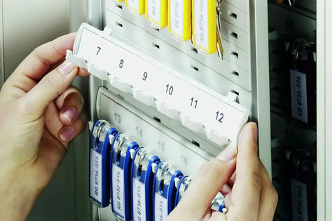 Space Saving 24 Key Wall Mount Rack In Gray Plastic with numbered rails and assorted key clip tags for organization