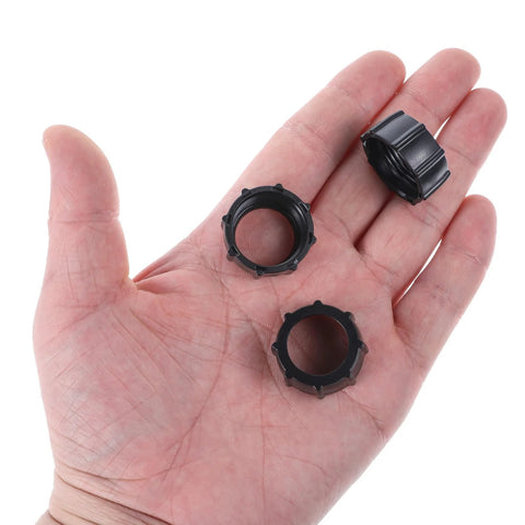 Four Pack 17mm Tightening Nuts For Car Phone Mounts Replacement Parts held in a hand, showcasing compact design and black color