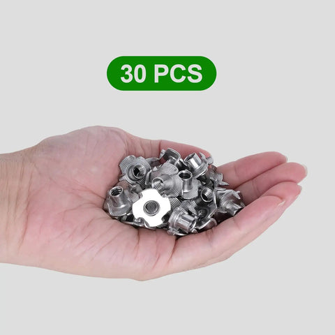 Hand holding 30-pack of Heavy Duty T Nuts One Quarter Inch 20 Thread Pack Of 30 304 Stainless Steel Four Jaw Tee Nuts