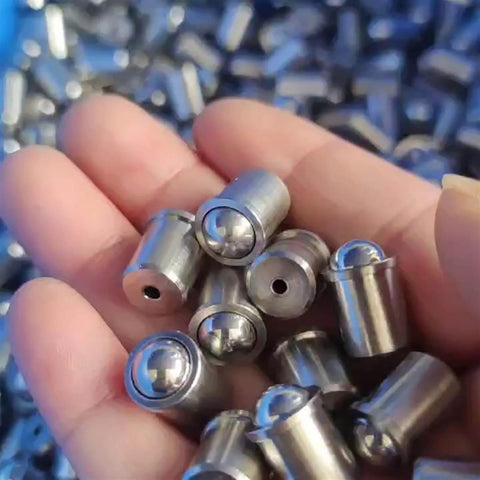 Hand holding 5pcs D5 x L6 304 Stainless Steel Ball Plunger, Push Fit Spring Loaded Ball Plungers for drive pulleys and positioning.