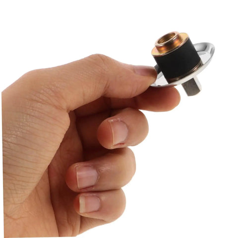 Hand holding Stainless Steel Juicer Coupling Replacement Plug And Play Drive Connector for various juicer models, durable kitchen accessory.