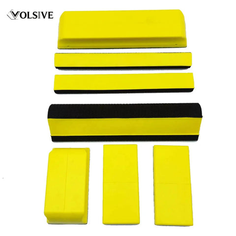 7 Piece Hand Sanding Block Set With Interchangeable Pads for auto body polishing, featuring yellow blocks in multiple sizes.