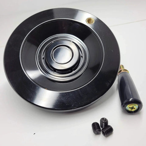 Black 5.5 Inch Heavy Duty Handwheel With One Half Inch Bore for drill press, featuring aluminum core and phenolic material.