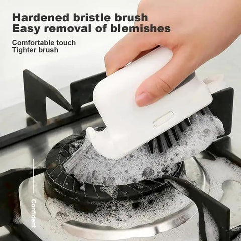 Hand using a hardened bristle brush to clean a stovetop burner, demonstrating effective removal of grime with a removable brush and scraper.