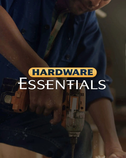 Person using power drill, close-up shot with 'Hardware Essentials' text overlay.