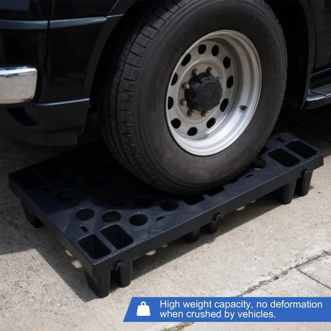 Nestable HDPE Plastic Pallet Set 6-pack under truck tire, showcasing durability with breathable grid design for versatile use.