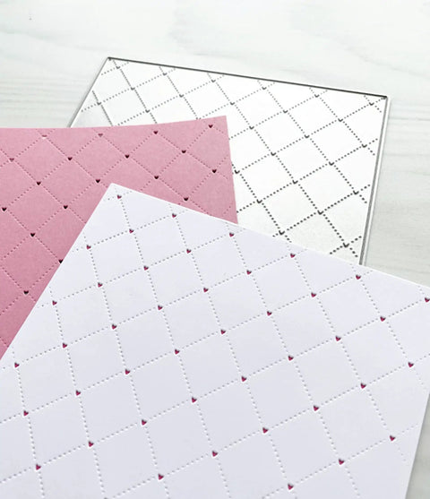 Heart Hole Rectangular Metal Die Cuts For DIY Scrapbooking And Card Making, Rhombus Hole Background Cutting Dies Stencils, Silver Carbon Steel Embossing Dies 14x11 cm displayed with embossed pink and white papers