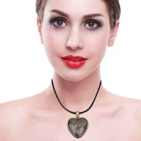 Woman wearing heart pendant from Necklace Base Tray Pendant Mold Kit For DIY Jewelry Making With 60 Pieces Of Metal And Plastic Shapes Durable.
